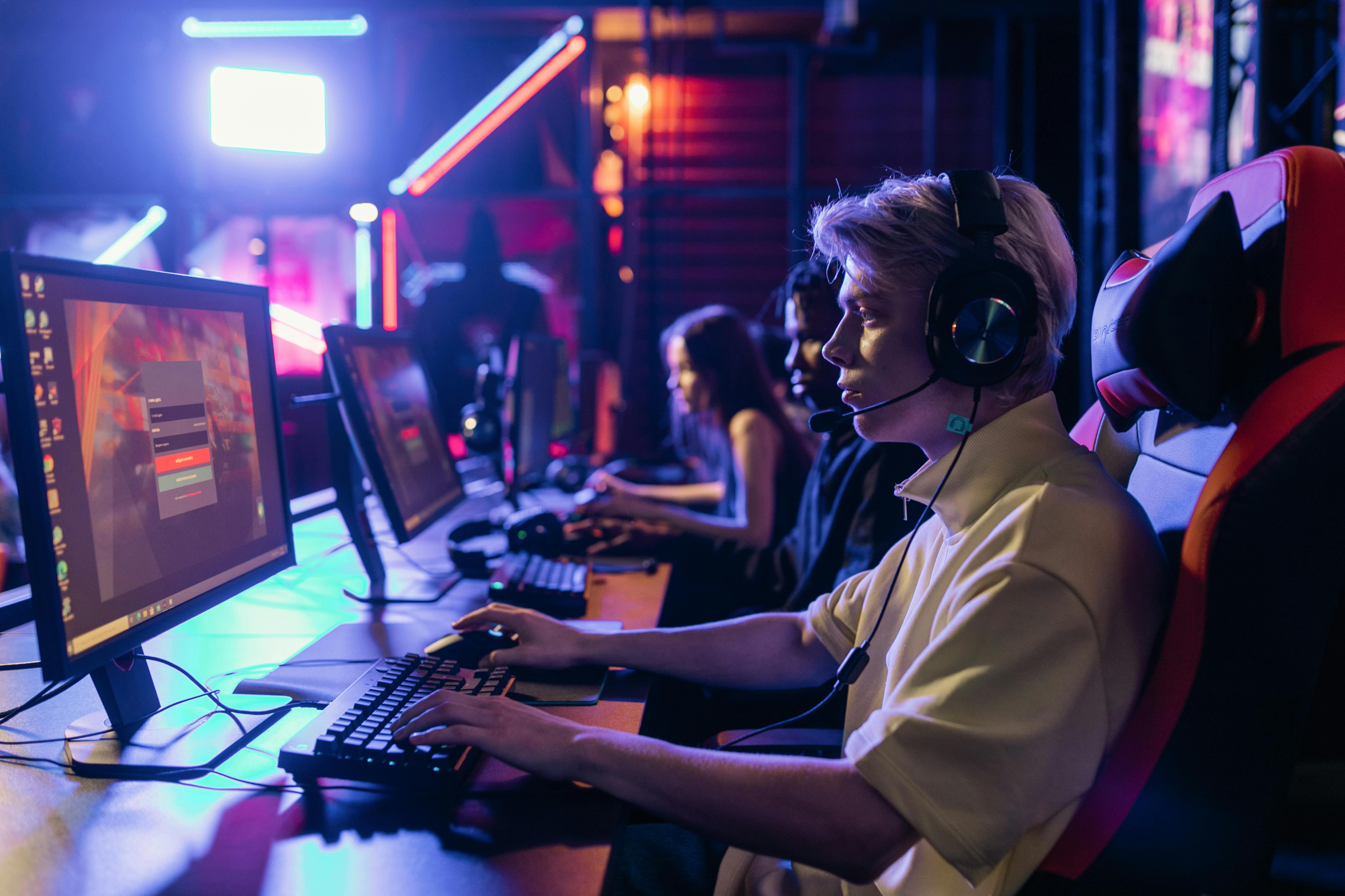 Picture showing a gamer playing video games.