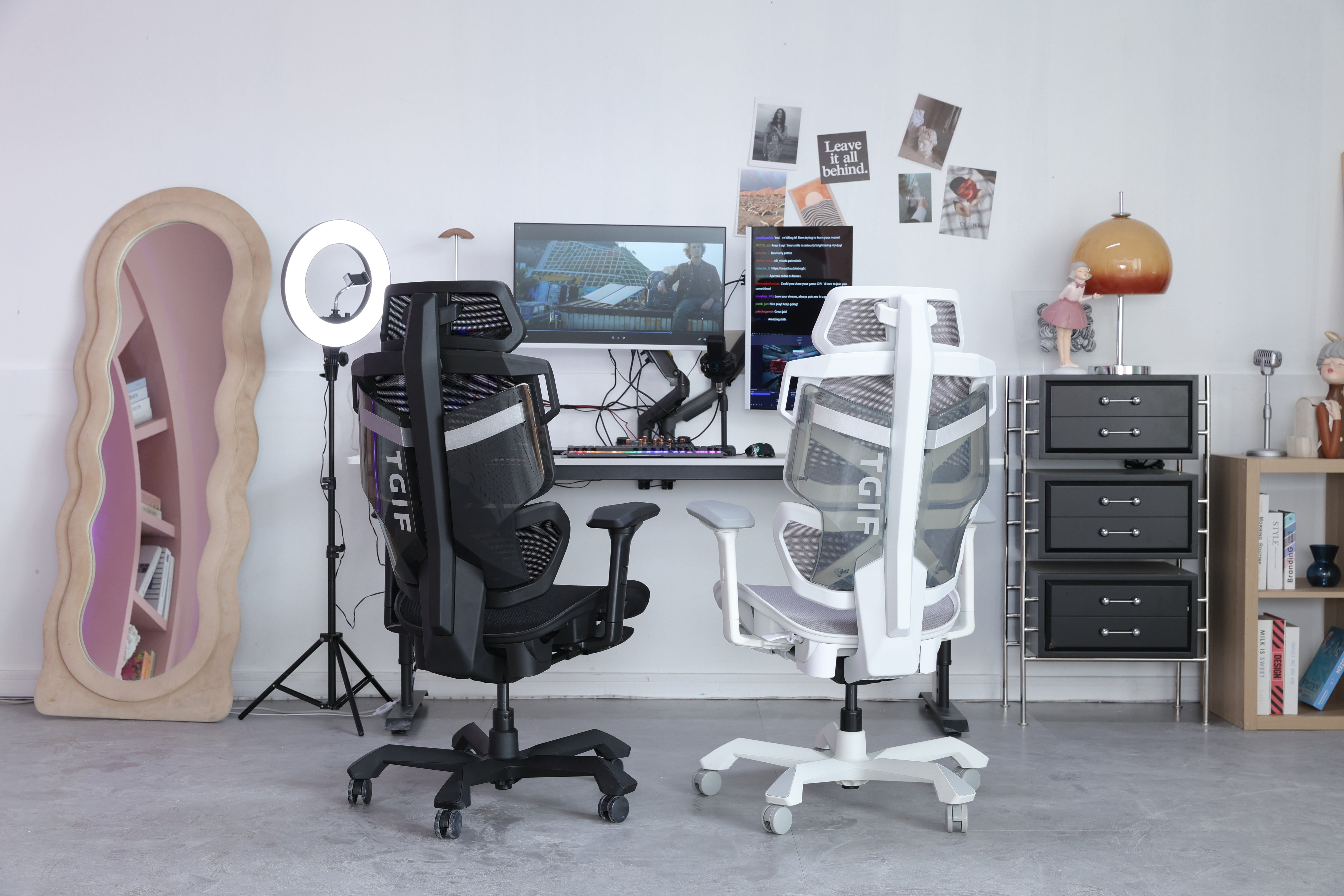 Picture showing two TGIF ACE game chairs seen from the back, with a black one on the left and a white one on the right. The two chairs are in front of a gaming setup