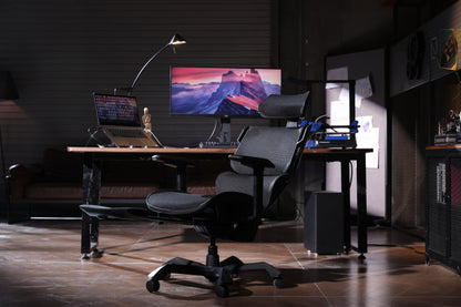 Picture showing a TGIF Ace Home black from the front side in front of a setup