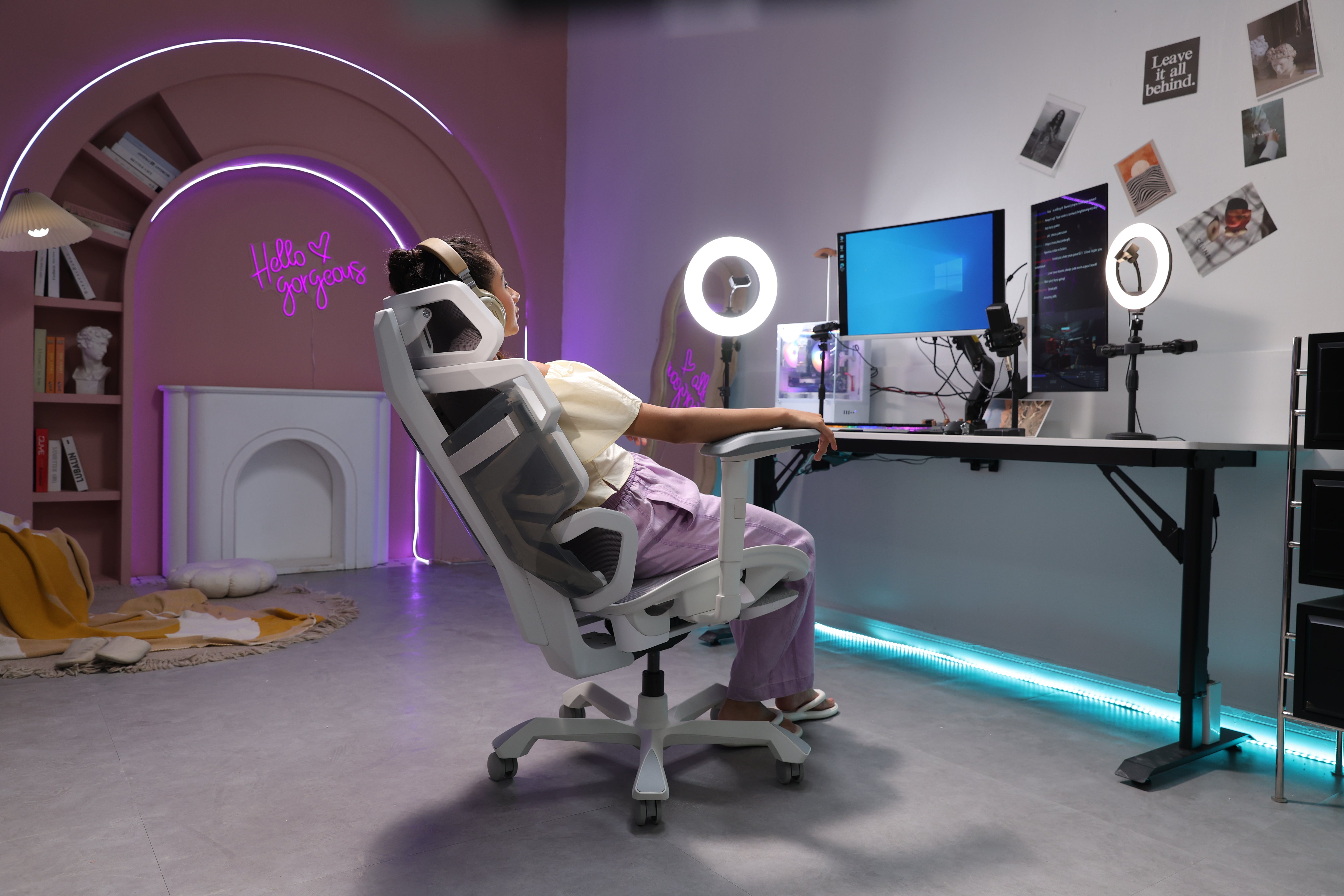 Picture showing the TGIF ACE Home white with a person sitting on it and the chair in a lying position