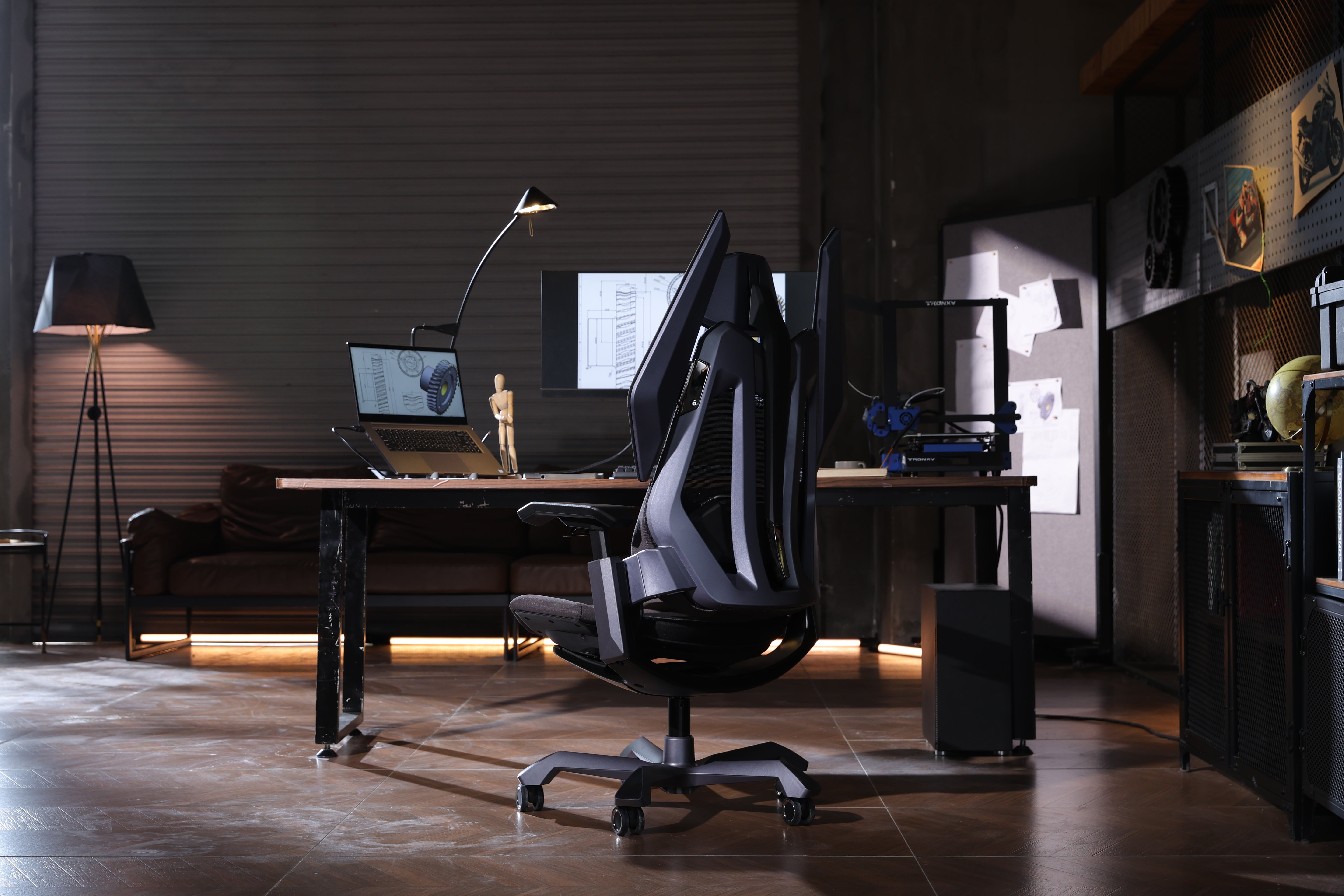 Picture showing the TGIF T0 from the back side in front of a desk.